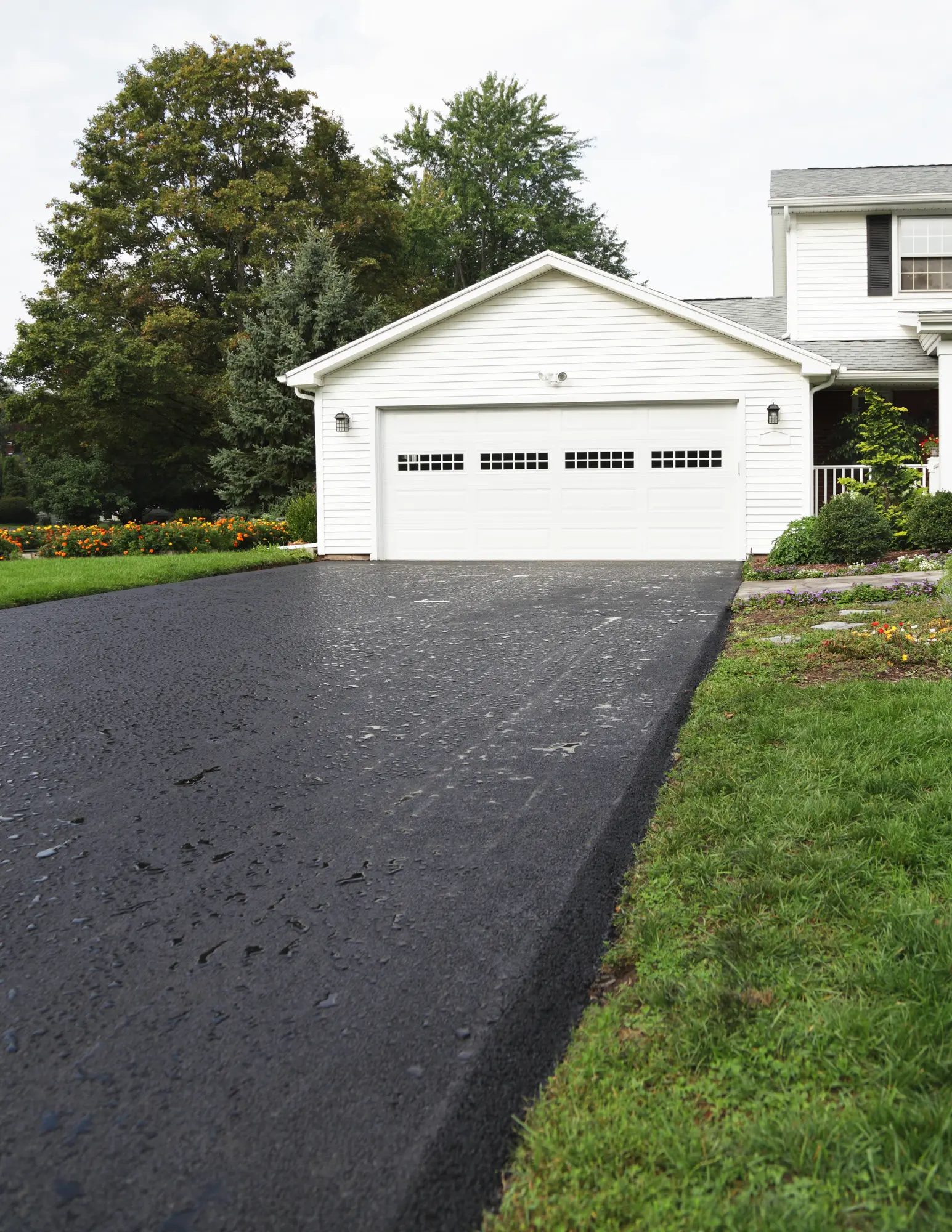 house with a sealed driveway